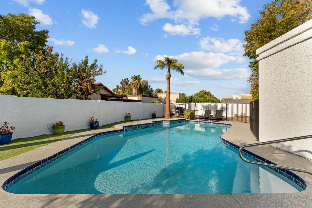 a swimming pool in the backyard of a house at Sumptuous 4br House W Private Heated Pool in Mesa