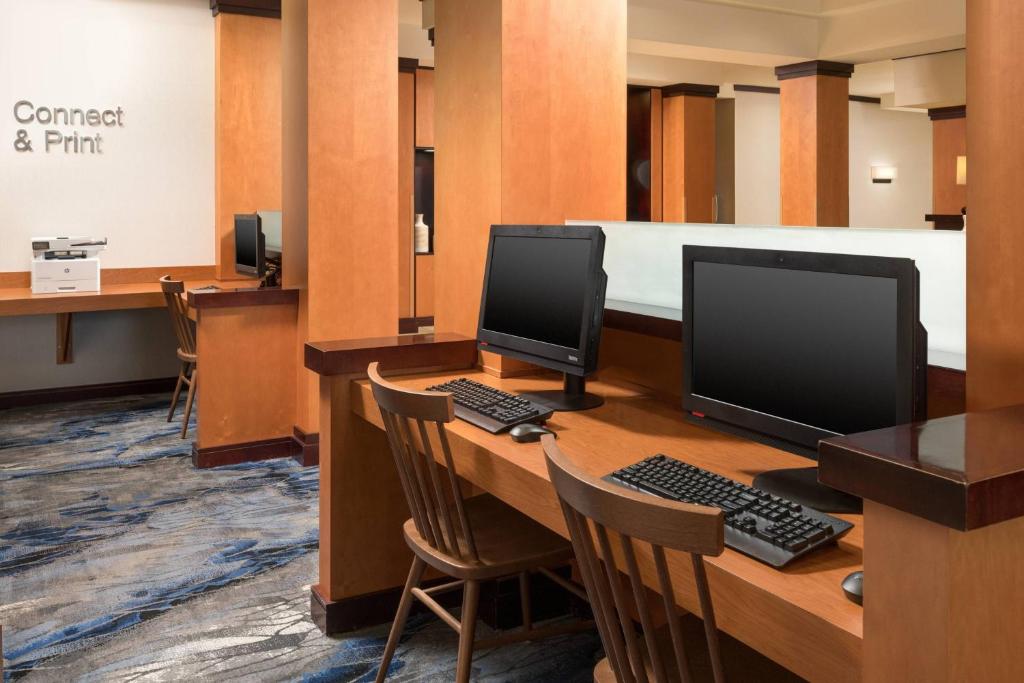 an office with two computer monitors on a desk at Fairfield Inn & Suites Chattanooga I-24/Lookout Mountain in Chattanooga