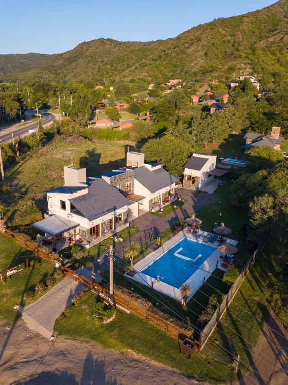 an aerial view of a house with a swimming pool at Portal de la Virgen in Villa General Belgrano