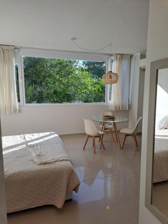 En eller flere senge i et værelse på Agora Neo