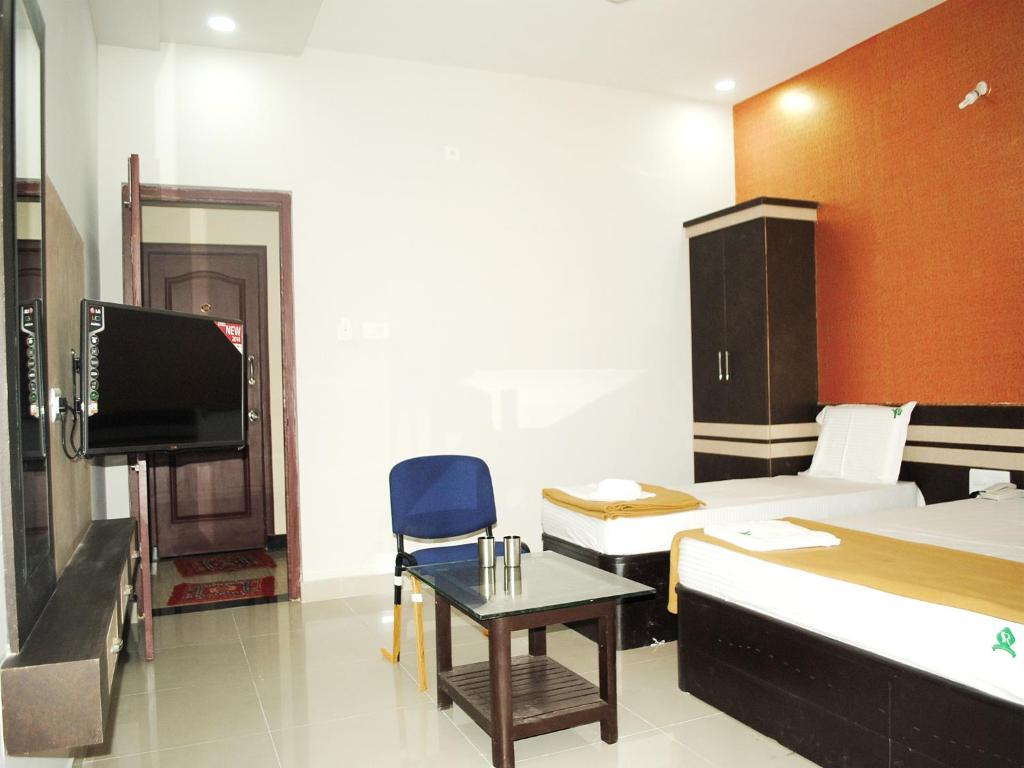 Postel nebo postele na pokoji v ubytování SSR Hotel
