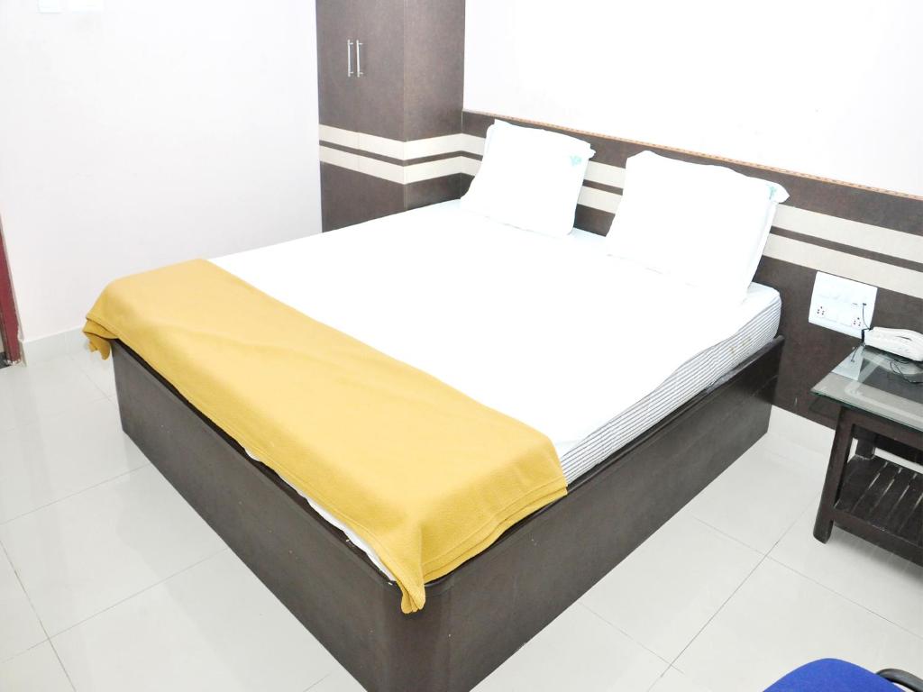 Postel nebo postele na pokoji v ubytování SSR Hotel