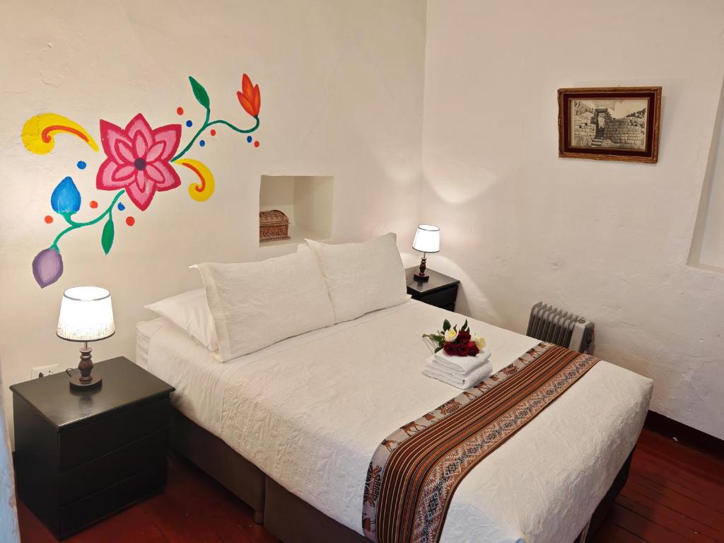 Postel nebo postele na pokoji v ubytování Gringo Bill's Cusco