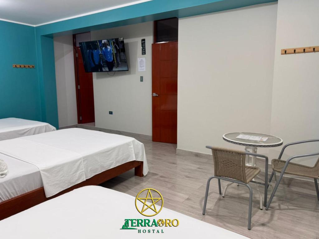 Postel nebo postele na pokoji v ubytování Hostal Terraoro
