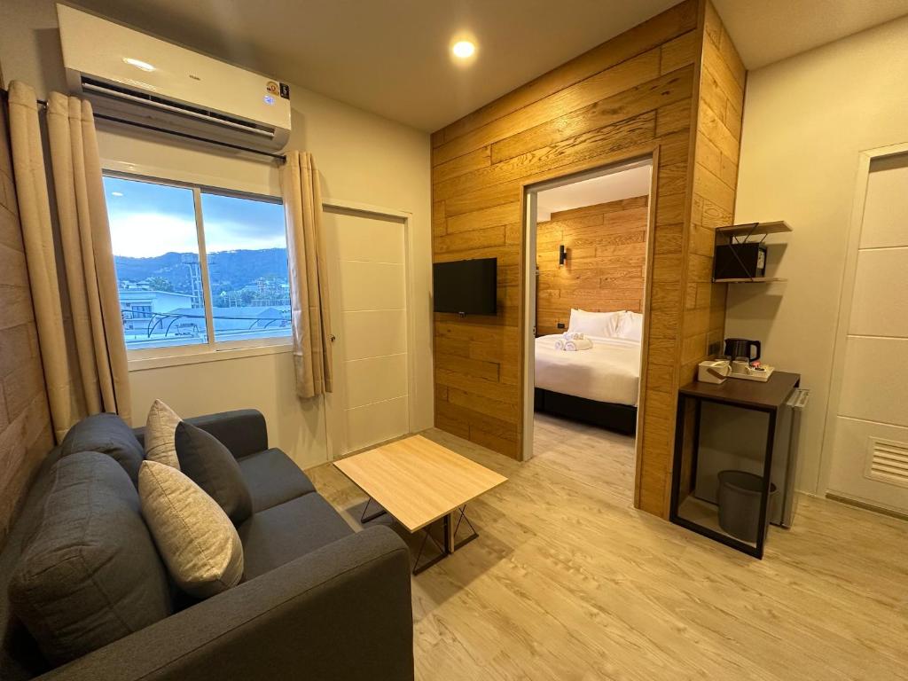 Ένα ή περισσότερα κρεβάτια σε δωμάτιο στο EbS Residence Chaweng