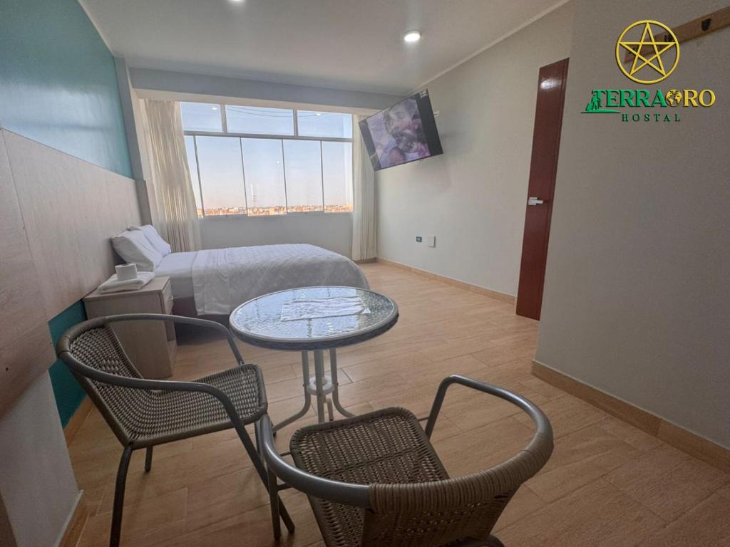 TV a/nebo společenská místnost v ubytování Hostal Terraoro