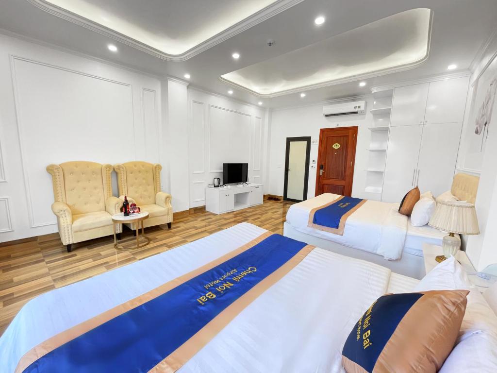 Postel nebo postele na pokoji v ubytování Chemi Hanoi Airport Hotel