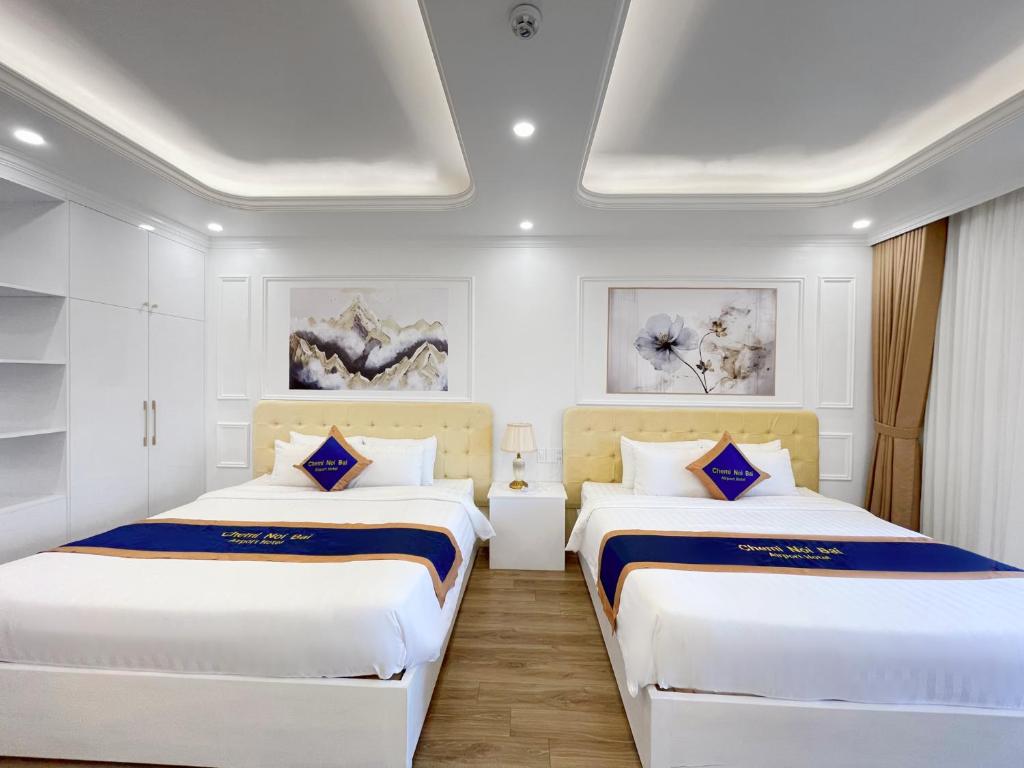 Postel nebo postele na pokoji v ubytování Chemi Hanoi Airport Hotel