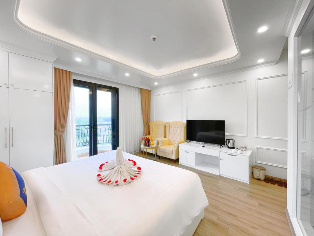 TV a/nebo společenská místnost v ubytování Chemi Hanoi Airport Hotel