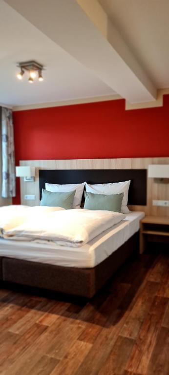 Postel nebo postele na pokoji v ubytování Hotel Pflug