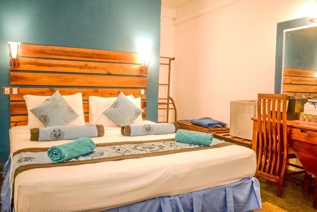Postel nebo postele na pokoji v ubytování Hotel Sunray
