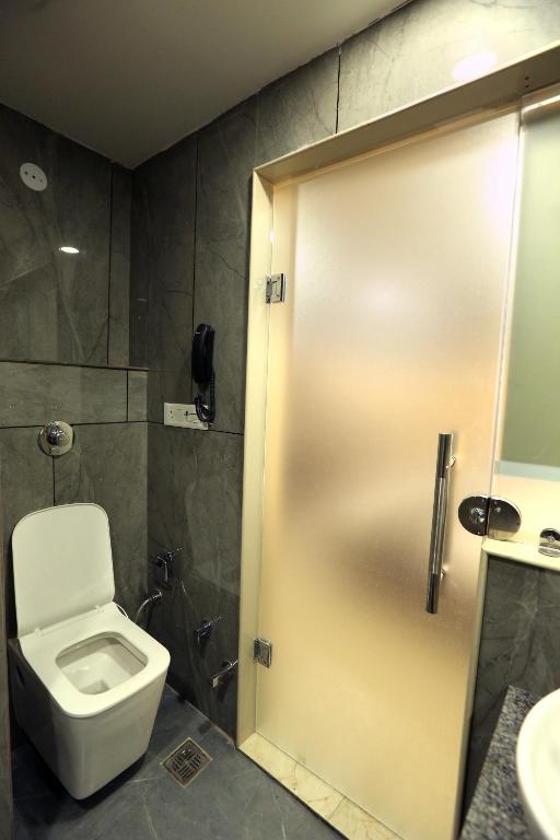 Koupelna v ubytování Hotel GC Grand Inn