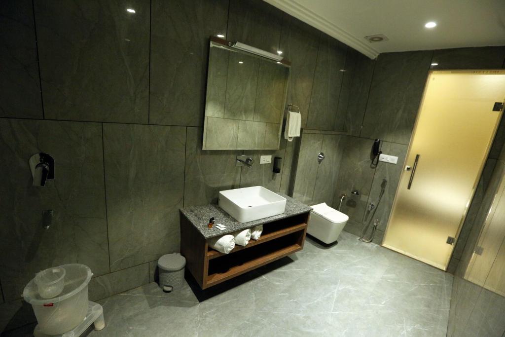 Koupelna v ubytování Hotel GC Grand Inn