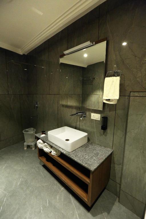 Koupelna v ubytování Hotel GC Grand Inn
