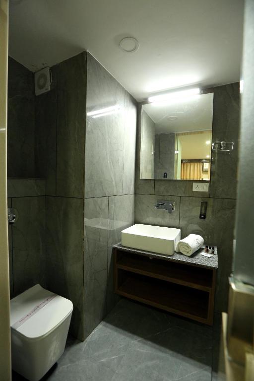 Koupelna v ubytování Hotel GC Grand Inn