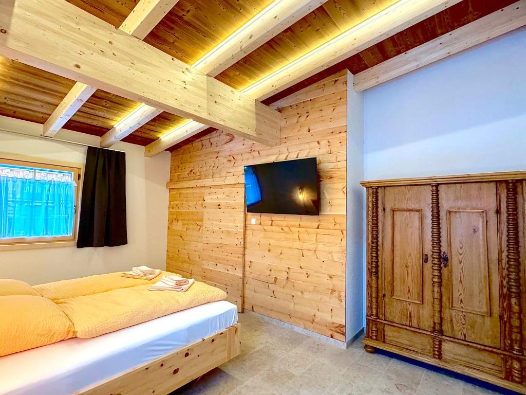 TV a/nebo společenská místnost v ubytování Landhaus Riesneralm