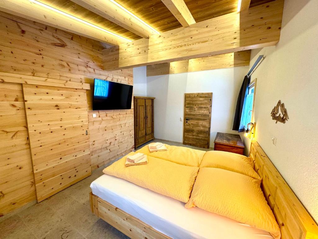 TV a/nebo společenská místnost v ubytování Landhaus Riesneralm