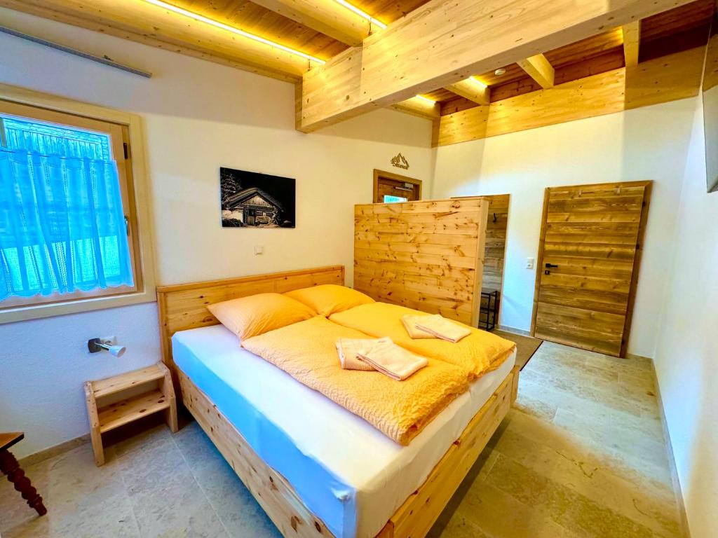 Postel nebo postele na pokoji v ubytování Landhaus Riesneralm