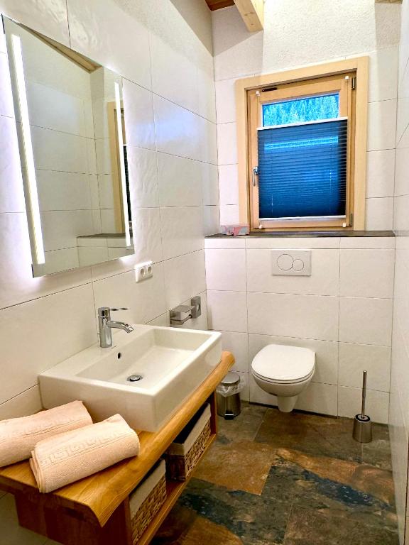 Koupelna v ubytování Landhaus Riesneralm