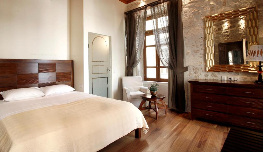 Postel nebo postele na pokoji v ubytování Leo Hotel