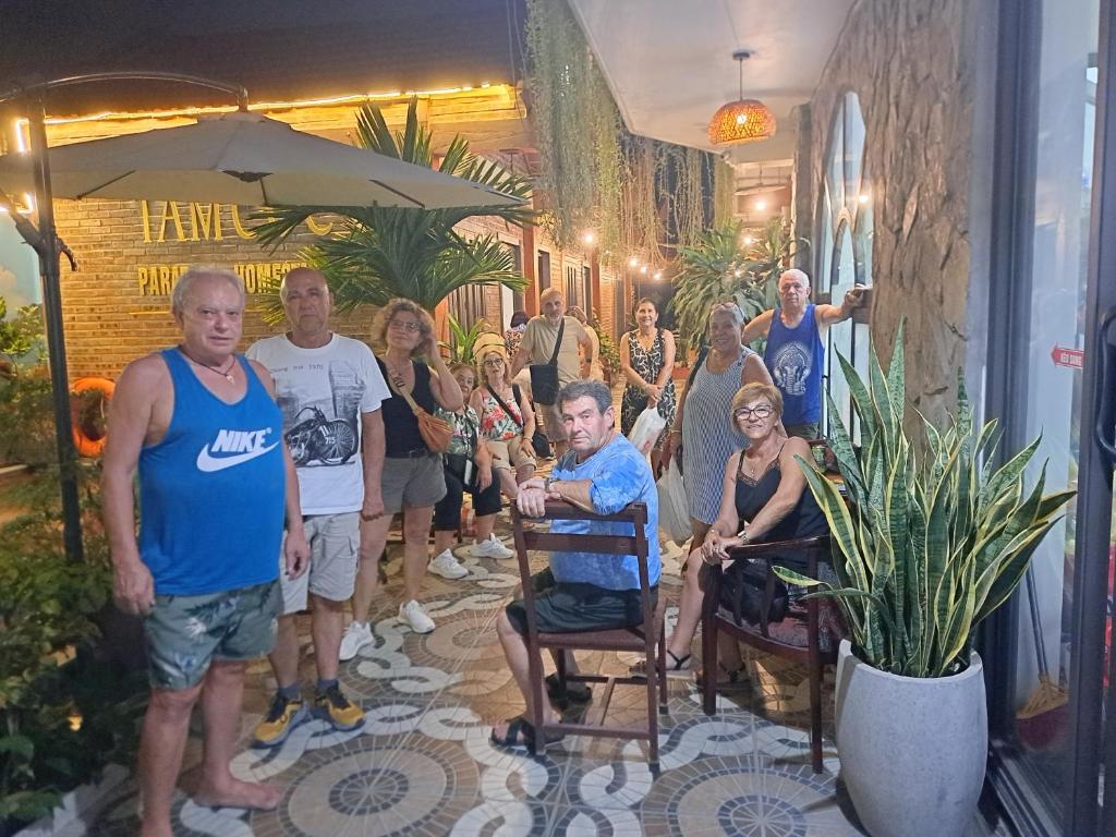 a group of people standing in a hallway at Tam Coc Paradise Homestay in Ninh Binh