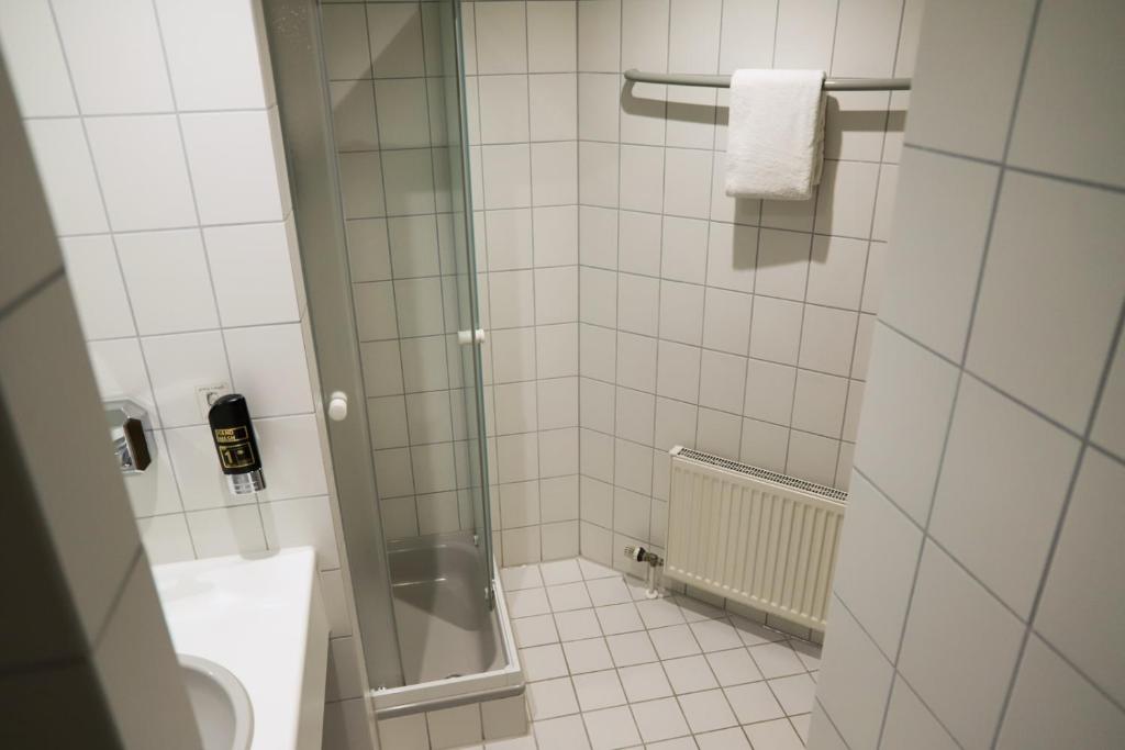 Koupelna v ubytování Hotel am Südtor