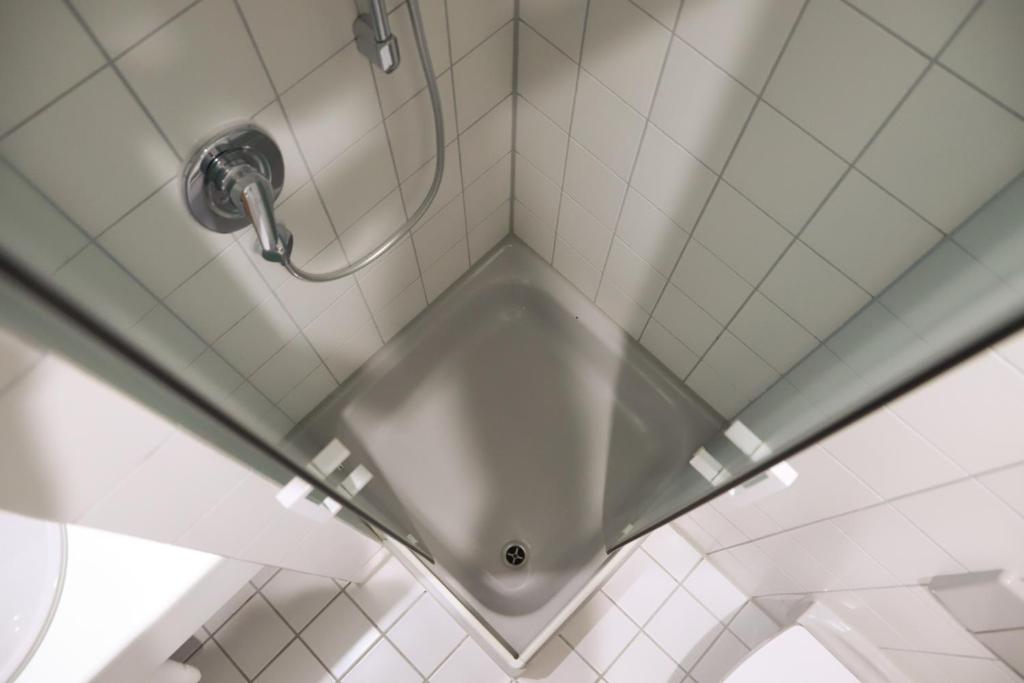 Koupelna v ubytování Hotel am Südtor