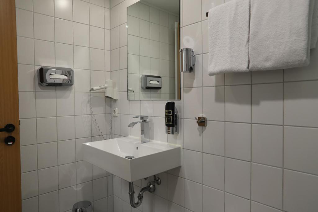 Koupelna v ubytování Hotel am Südtor