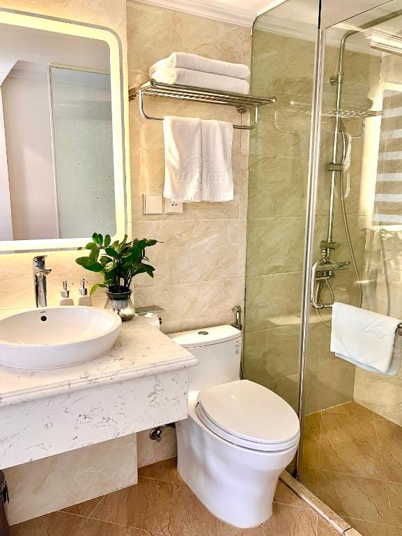 Koupelna v ubytování DE LA SOIE Hotel & Travel