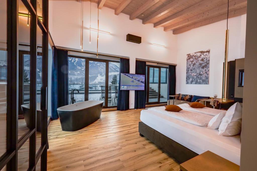 TV a/nebo společenská místnost v ubytování Sonja Alpine Resort