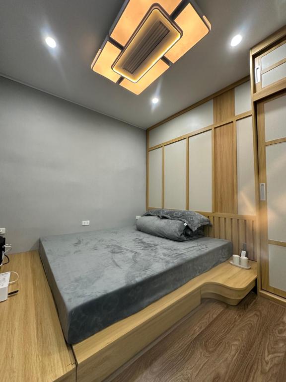 Postel nebo postele na pokoji v ubytování HaNoi HomeStay 43