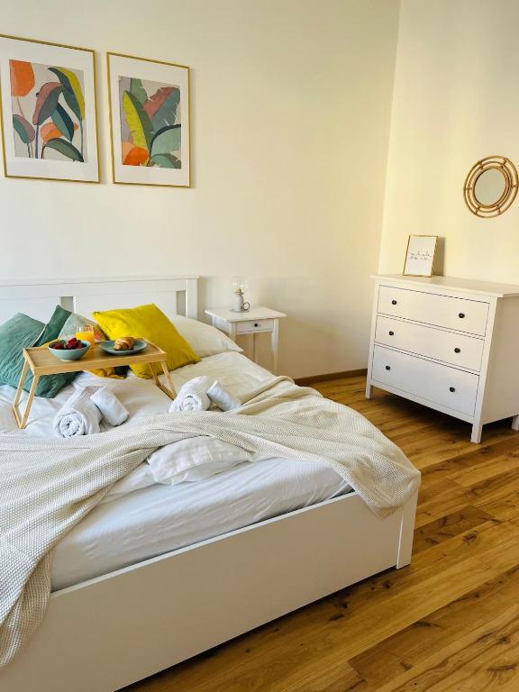 Posteľ alebo postele v izbe v ubytovaní Central City Retreat