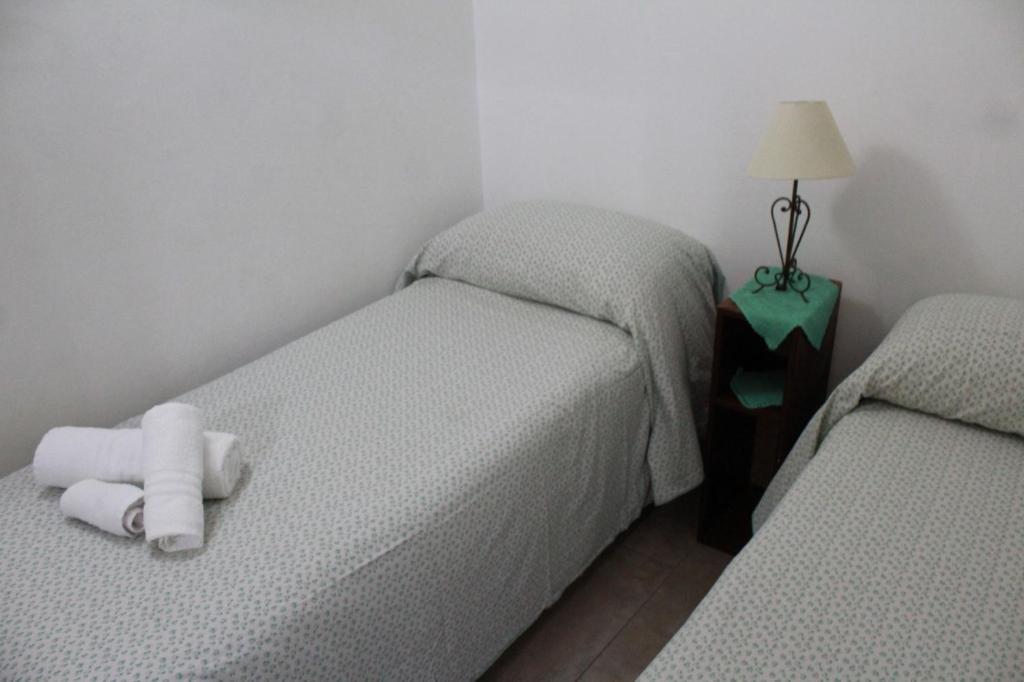 A bed or beds in a room at casa salusa