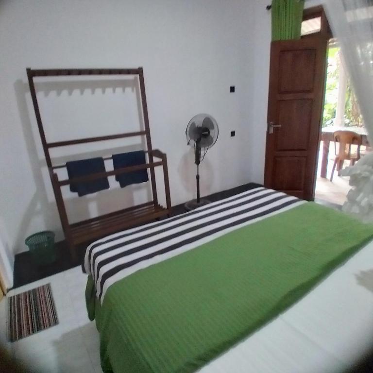 Postel nebo postele na pokoji v ubytování Little Hideaway Guest Home