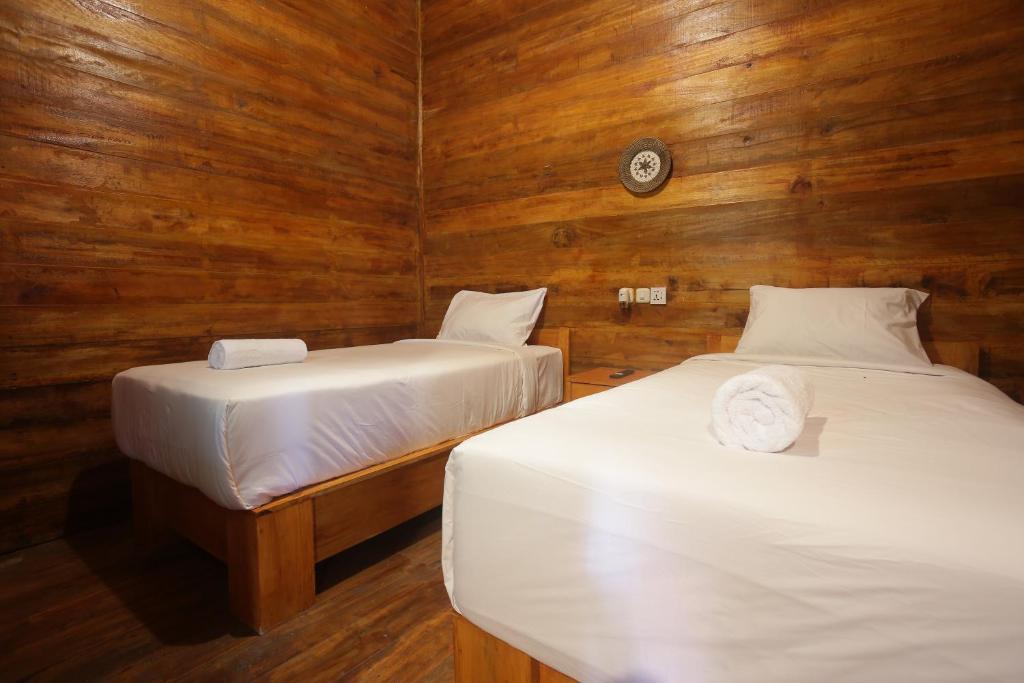 Postel nebo postele na pokoji v ubytování Villa Nusa Summerville