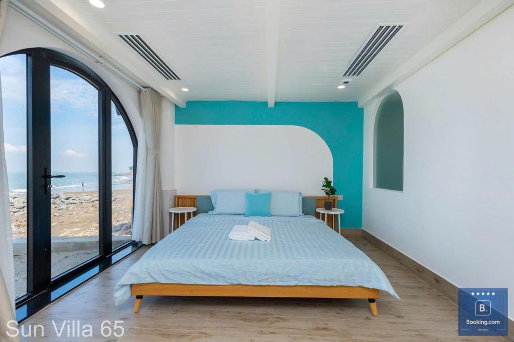 Postel nebo postele na pokoji v ubytování Sun Villa 65 - View Biển Trực Diện