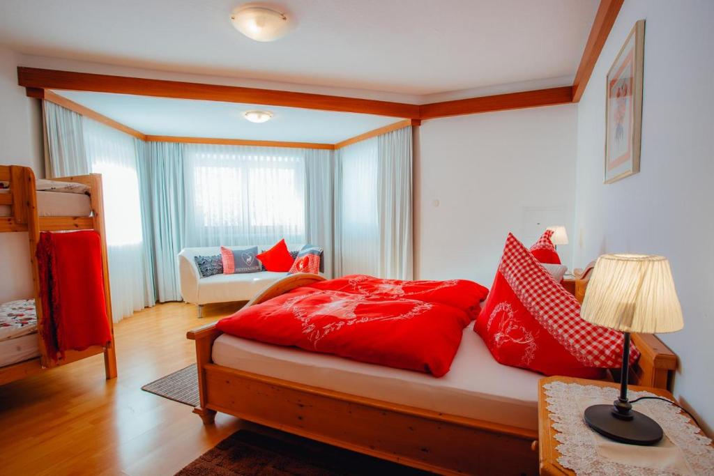 A bed or beds in a room at Appartement ERIKA by MoniCare (Haus Claudia)