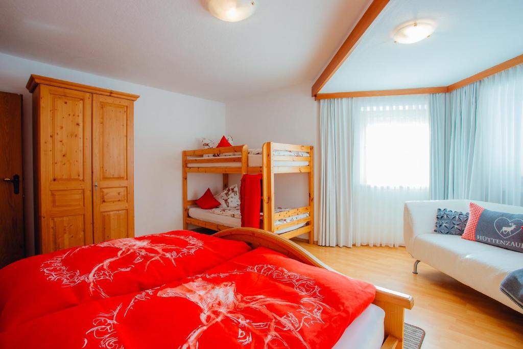 A bed or beds in a room at Appartement ERIKA by MoniCare (Haus Claudia)