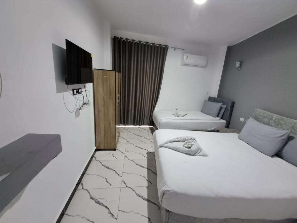 Postel nebo postele na pokoji v ubytování NADA - HOTEl