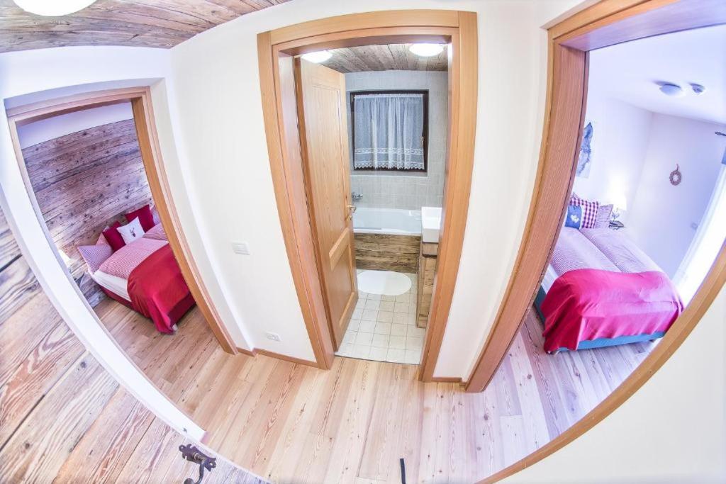 A bed or beds in a room at Appartement Letizia mit Sauna by MoniCare