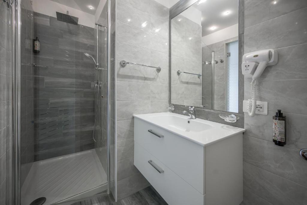 Kúpeľňa v ubytovaní Hotel Villa Paradiso Suite