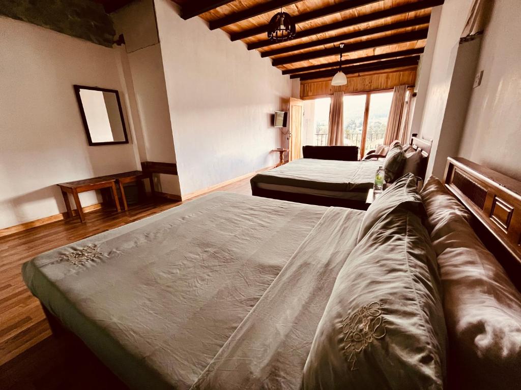 Letto o letti in una camera di Medalin Lake Gregory