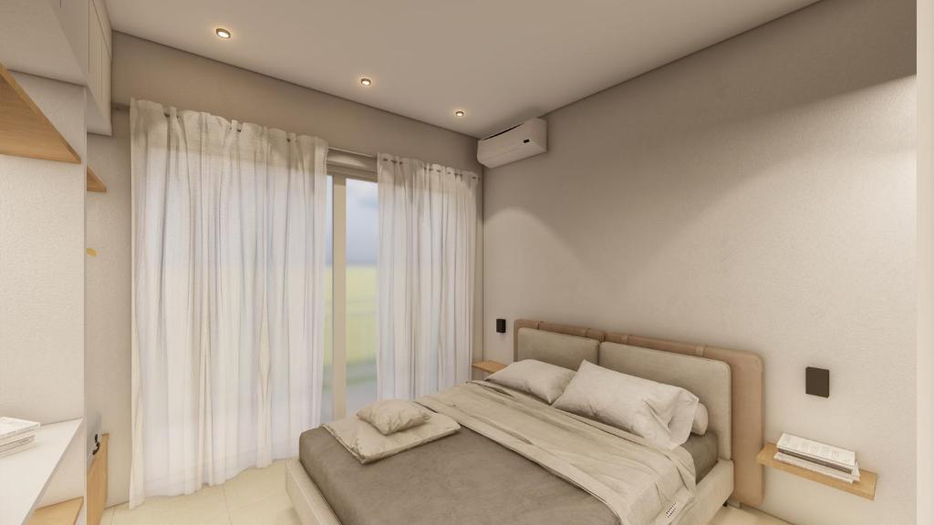 Posteľ alebo postele v izbe v ubytovaní Vera Villa - Brand New Seafront Villa!
