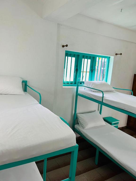 Postel nebo postele na pokoji v ubytování Hostel by 47