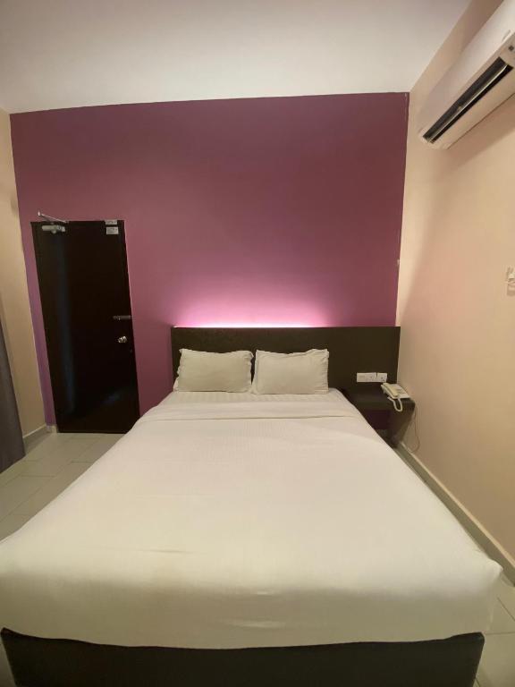 Postel nebo postele na pokoji v ubytování Hotel Mirage PD