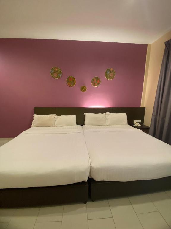 Postel nebo postele na pokoji v ubytování Hotel Mirage PD