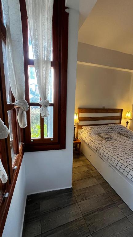 Postel nebo postele na pokoji v ubytování Kuyu Beergarden Hostel