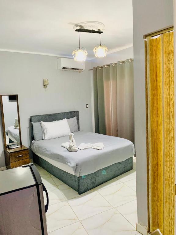 Postel nebo postele na pokoji v ubytování NADA - HOTEl