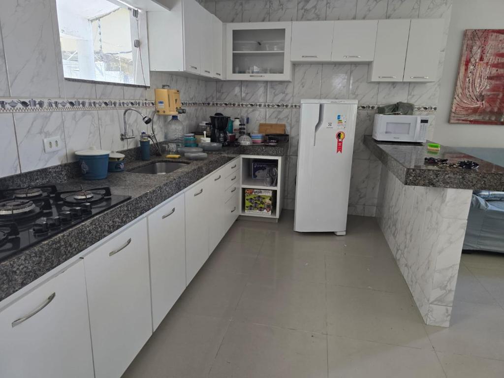 Kuchyň nebo kuchyňský kout v ubytování Villa do Rainer