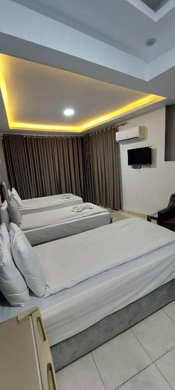 Postel nebo postele na pokoji v ubytování NADA - HOTEl